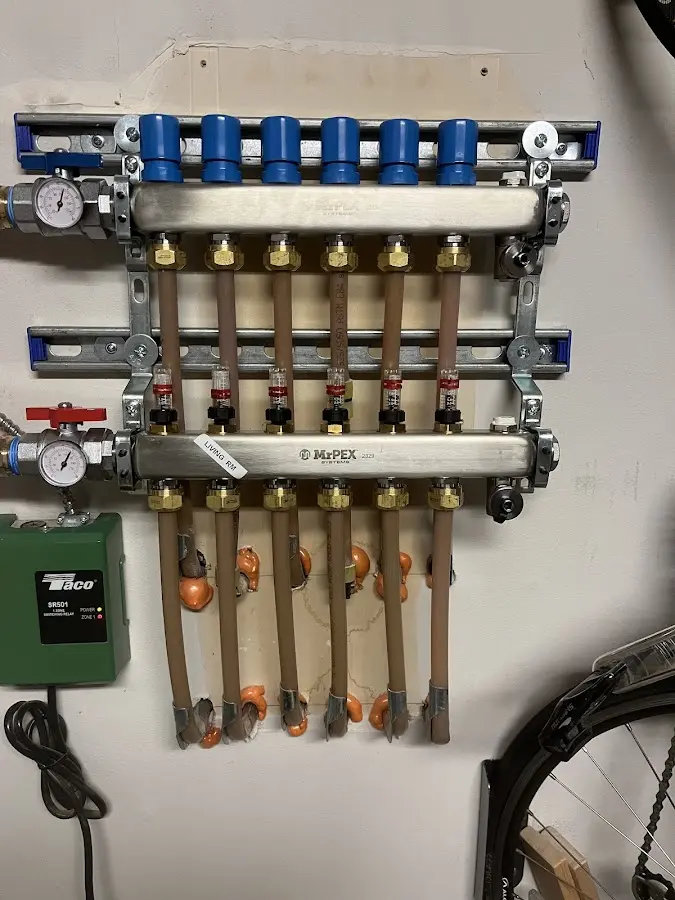 Plumber performing Water Heater Repair at a residential property in Rio Pinar